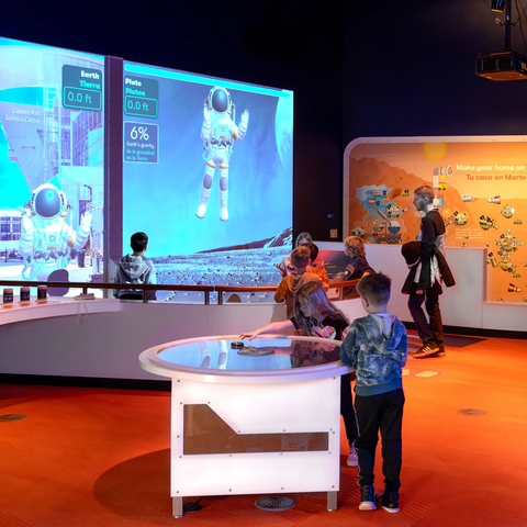 Kids walking around in Exploring Space