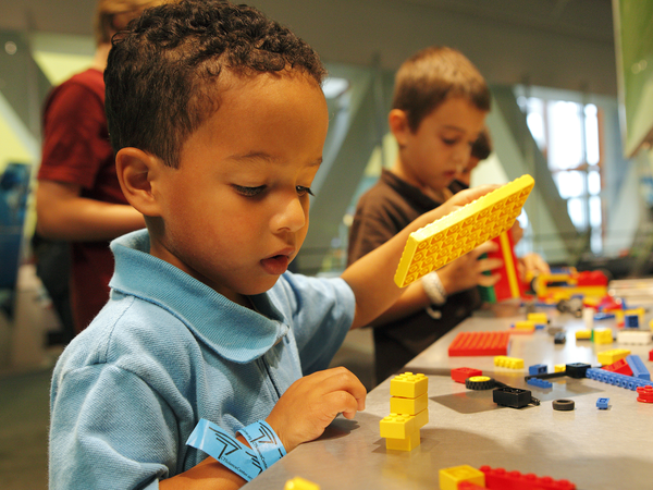 Toddler with Legos