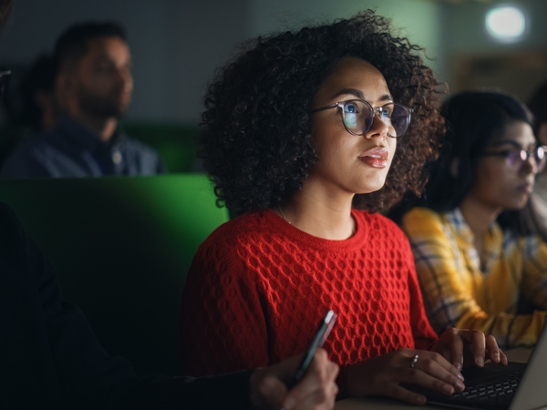 Young women in front of computer